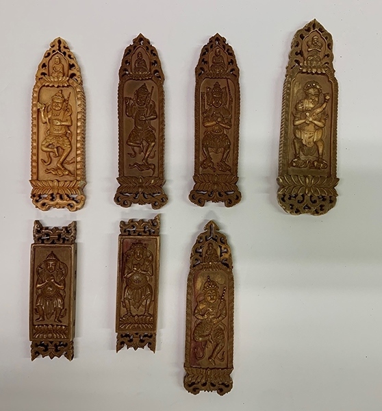 木雕牌飾（暫定名）。國家文物局供圖