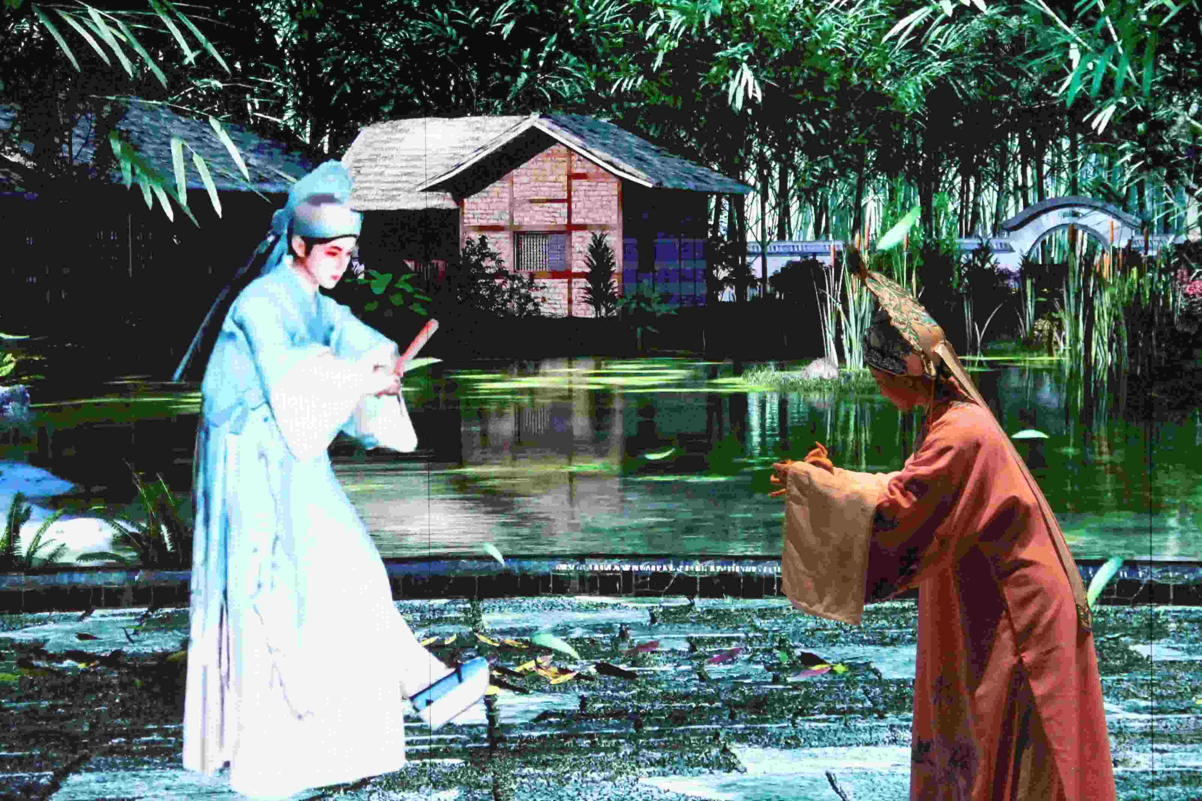 真人演員與虛擬人演員在“元啟金陵”南京數(shù)字文化客廳出演《梁山伯與祝英臺(tái)》經(jīng)典選段。受訪者供圖