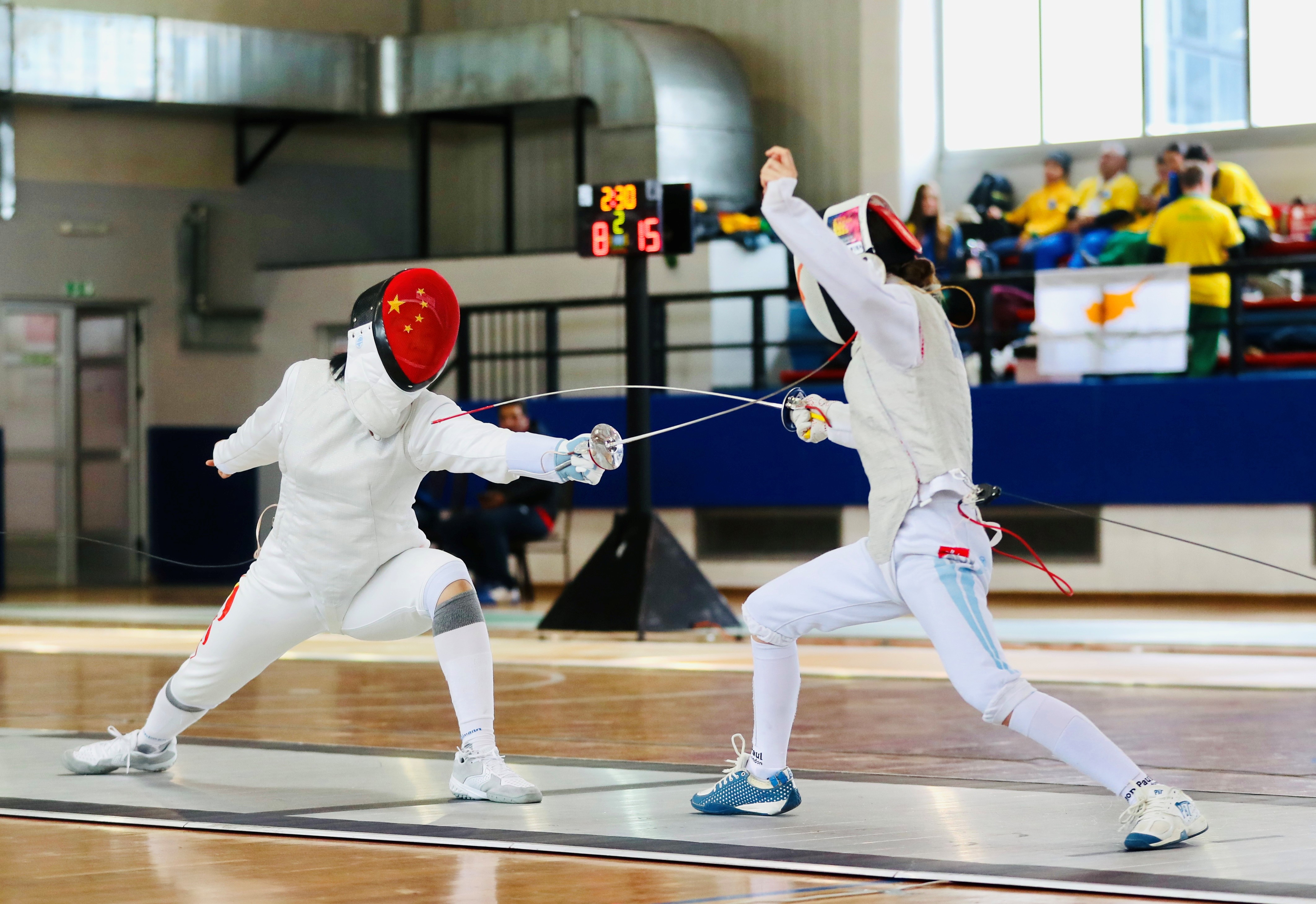 閔文珺（左）在比賽中。圖片來源：中國中學(xué)生體育代表團