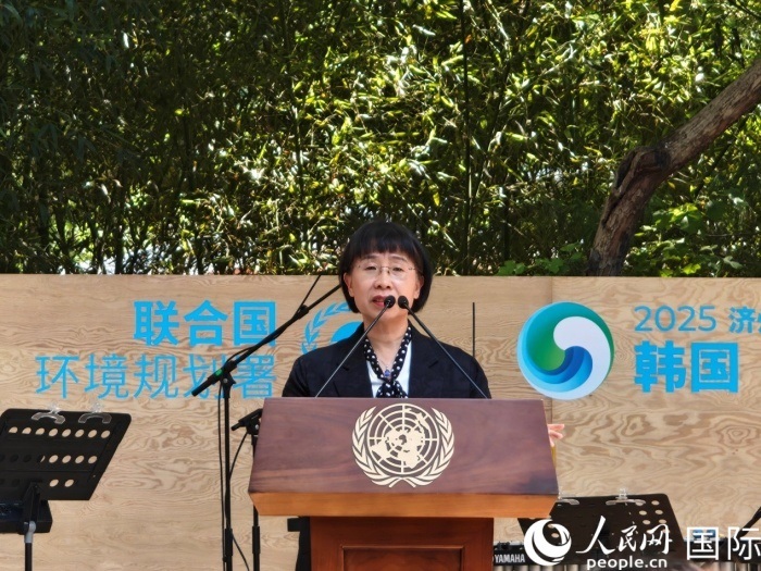 周國(guó)梅致辭。人民網(wǎng)記者 李明攝